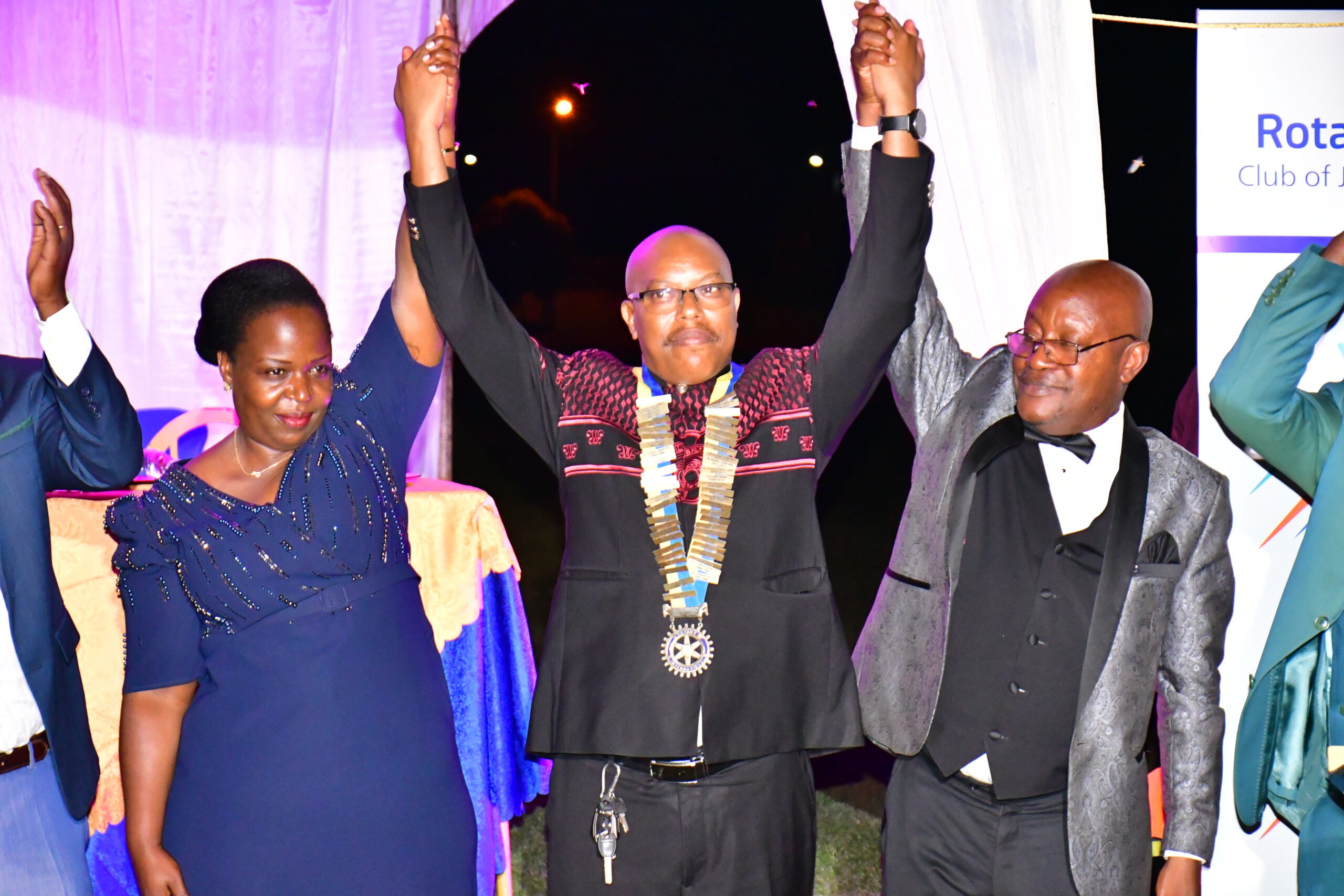 PDG Rtn. Mike Ssebalu shows the newly installed President to the all Rotarians and Guests